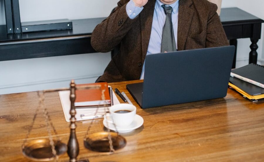 lawyer talking on smartphone in law office